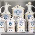 P18. Anitque porcelain canister set. 